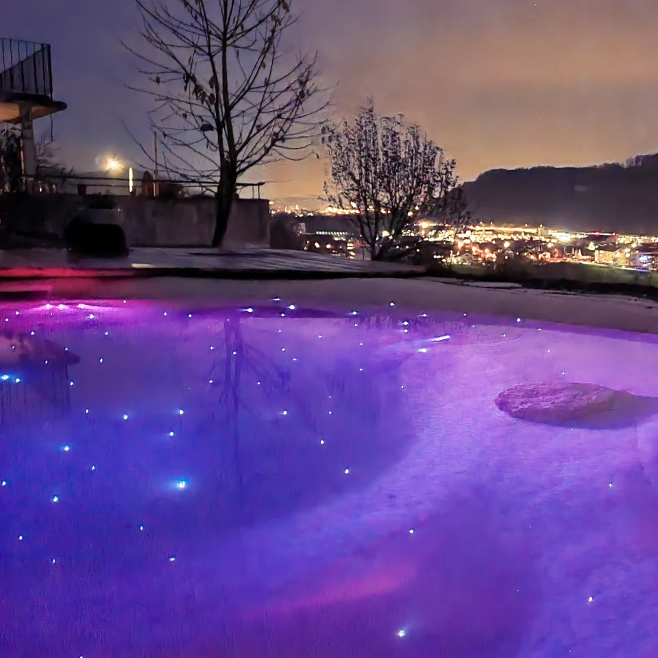 BEACHPOOL mit Sternenbeleuchtung bei Nacht – BEACHPOOL.DESIGN GmbH